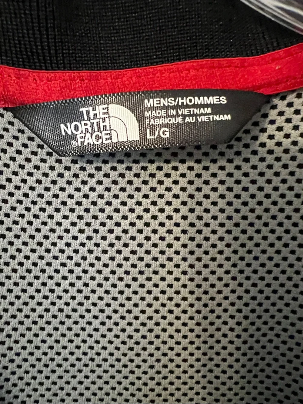 The North Face Black Polo with Red Logo Accent